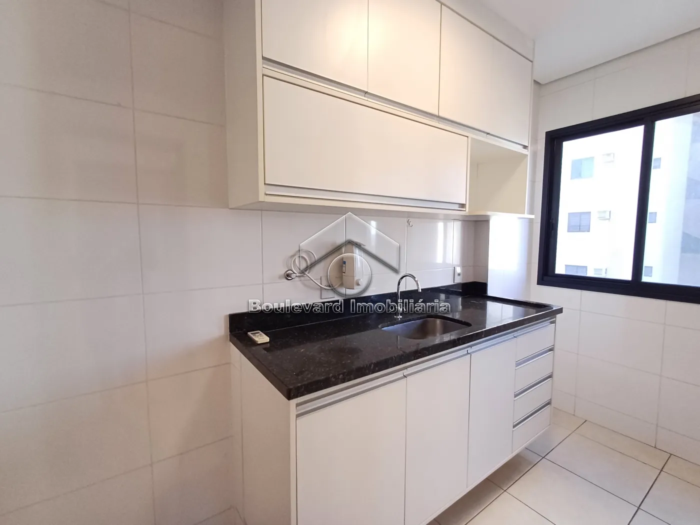 Cozinha Alugar Apartamento / Padrão em Ribeirão Preto R$ 1.700,00 - Foto 15