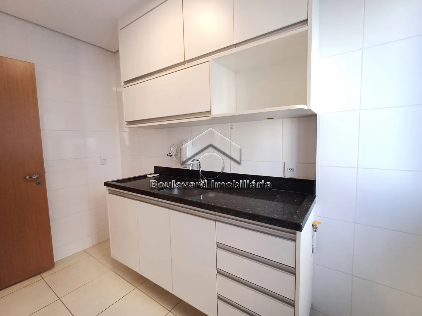 Cozinha Alugar Apartamento / Padrão em Ribeirão Preto R$ 1.700,00 - Foto 16